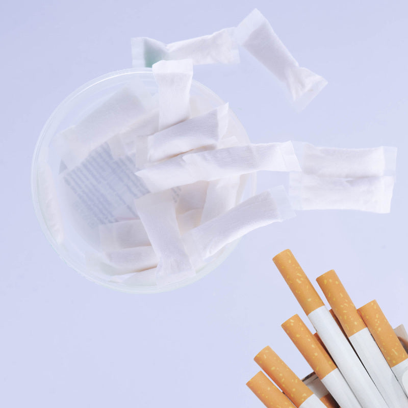 A photo showing nicotine pouches and cigarettes