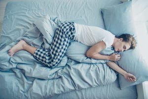 Boy in bed sleeping