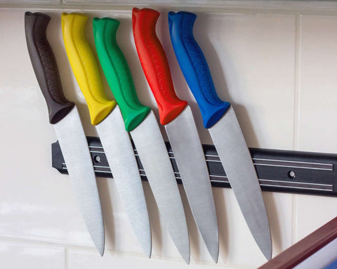 Color coded knives on a magnetic strip