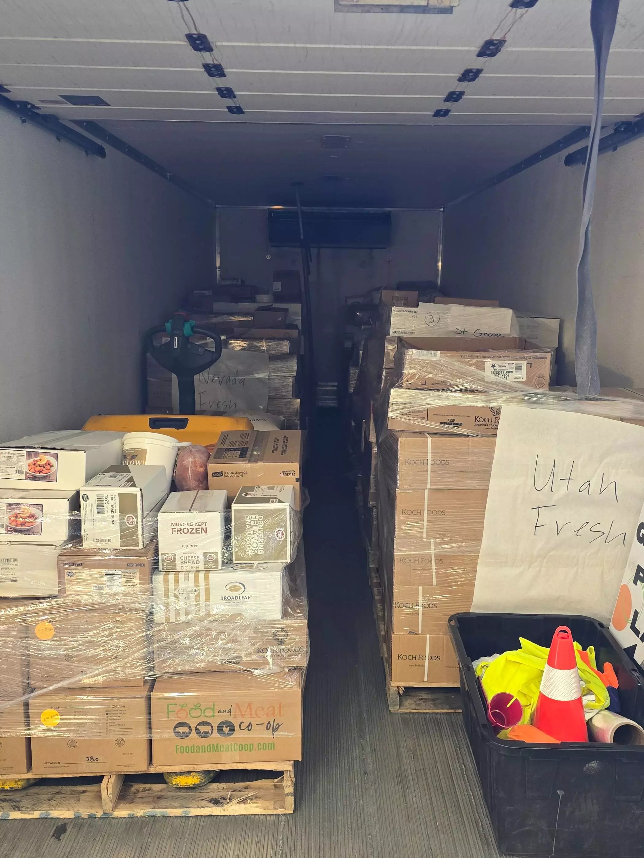 community co-op products loaded in back of refrigerated truck