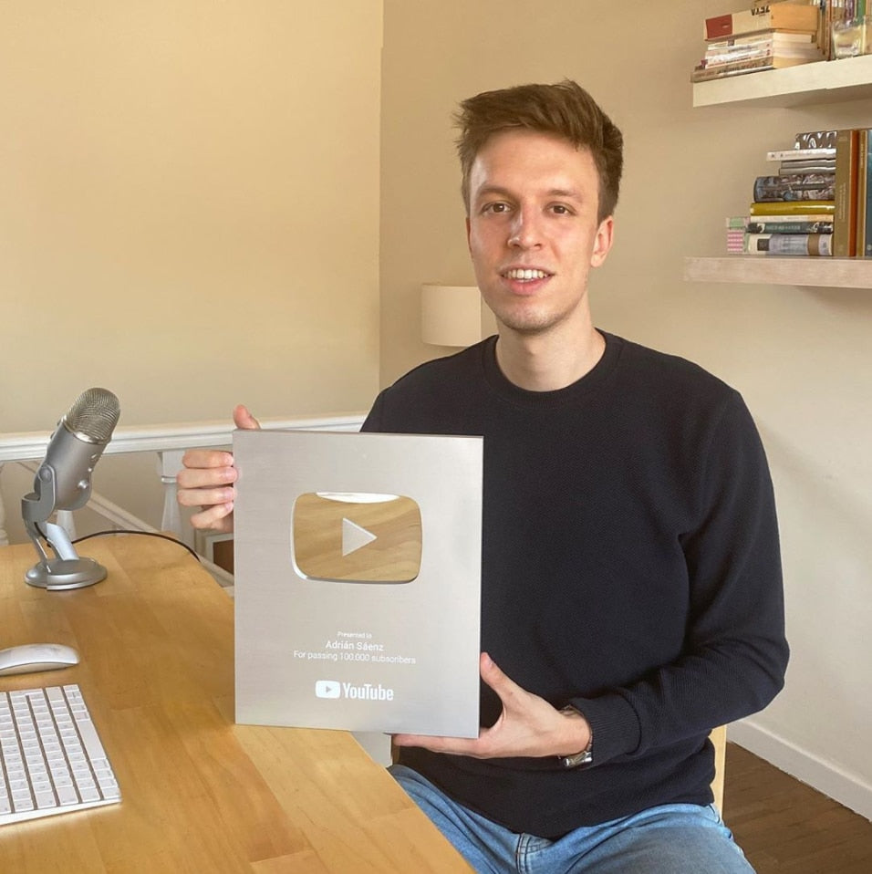 Adrian Saenz holding YouTube plaque