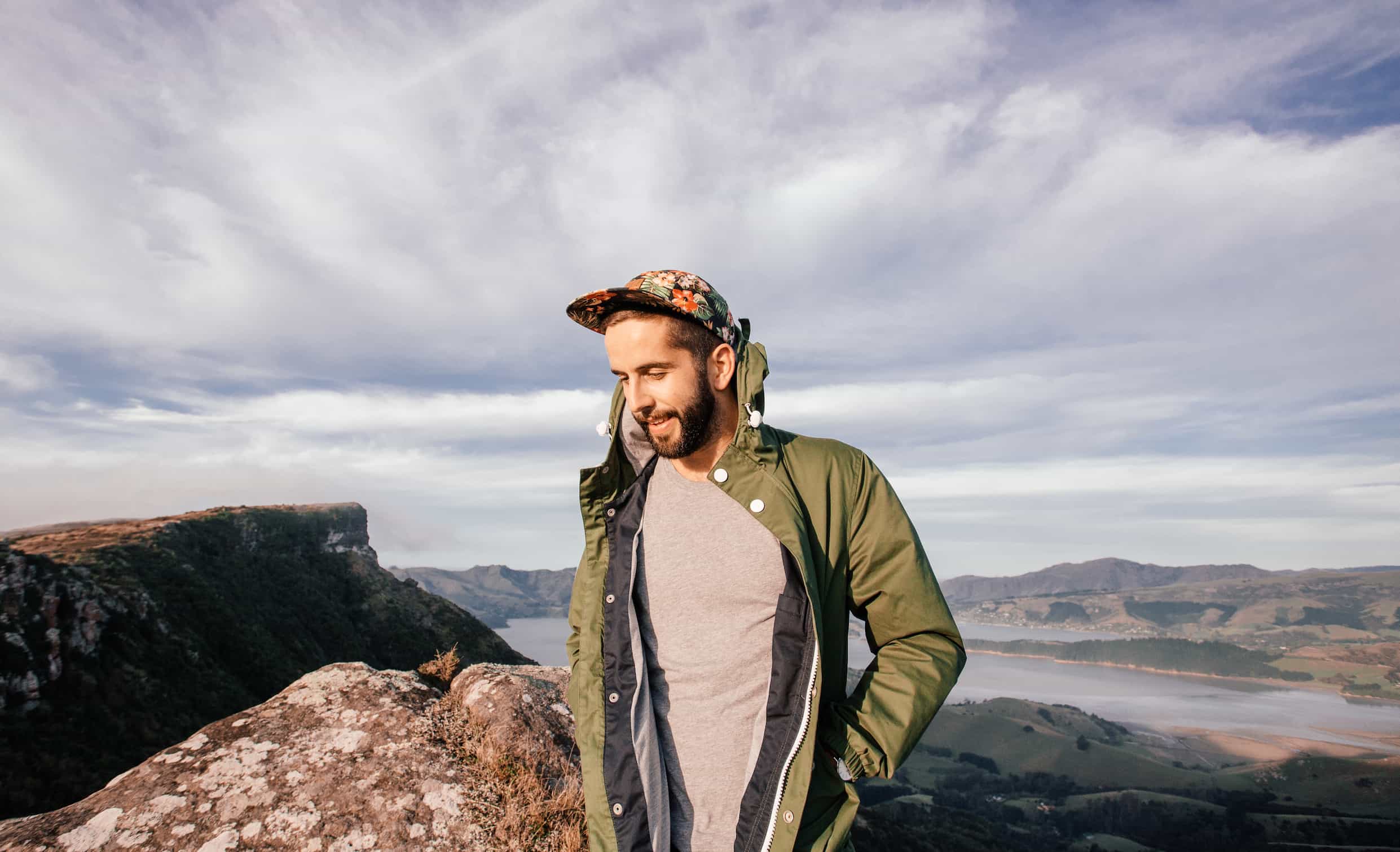 Adrien Taylor wears an Offcut hat on a rugged landscape