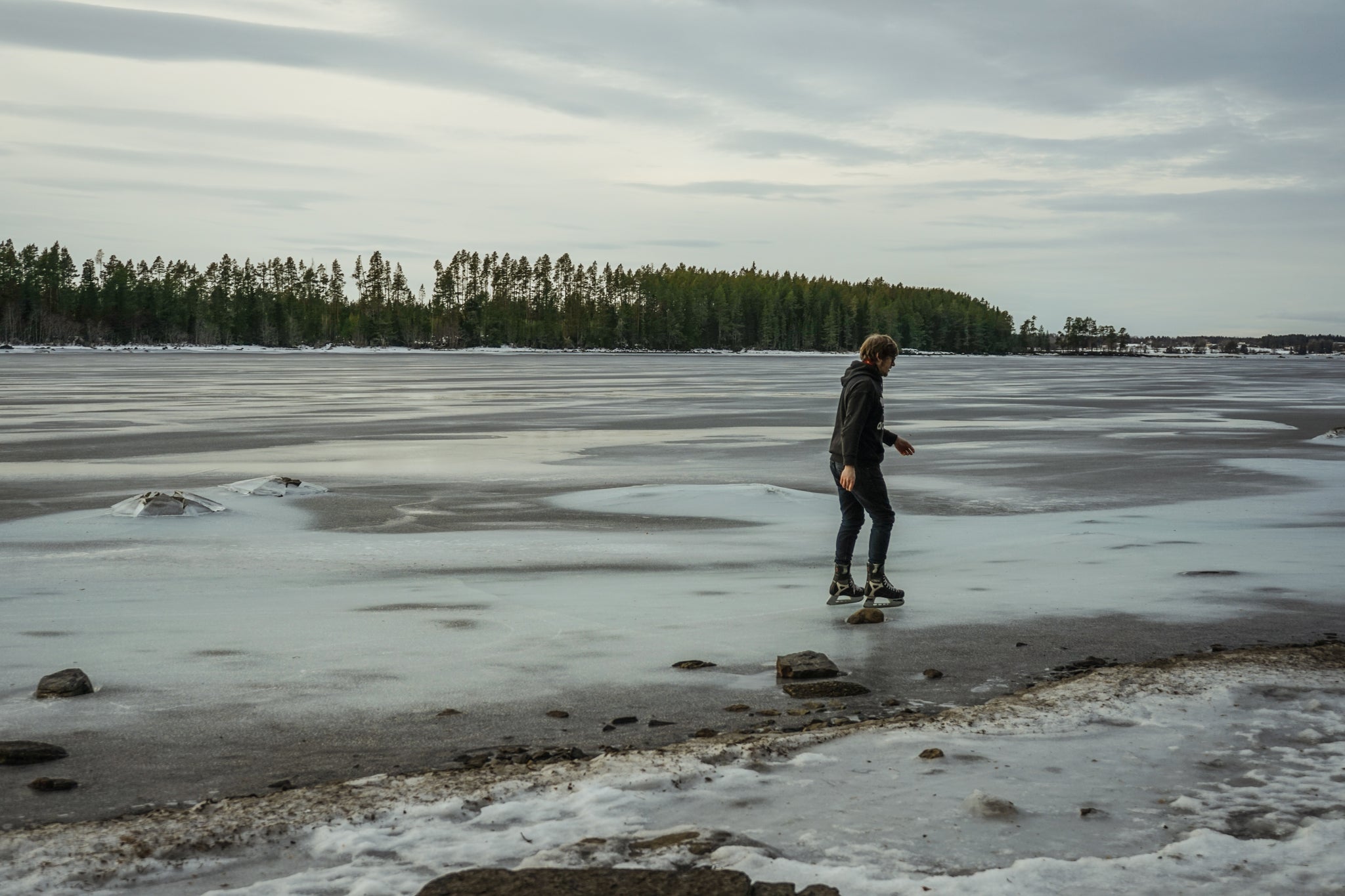 robin ice scating on a lake