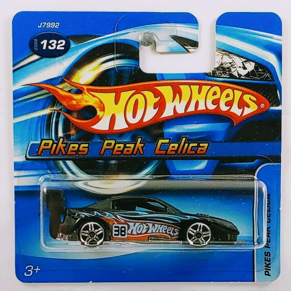 Hot Wheels 2006 - Collector # 132/223 - Pikes Peak Celica - Black - Orange  Wing - PR5 Wheels