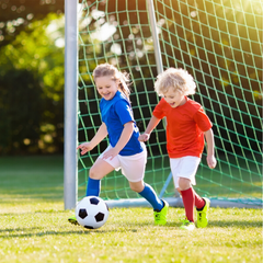 Kids playing with the soccer ball