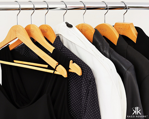 Find the value of x on the clothes hanger. What type of triangle must the  hanger be to hang clothes evenly? 