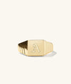 Square Signet Ring featuring a prominent letter engraved on the gold face, designed for a bold addition to your jewelry collection.
