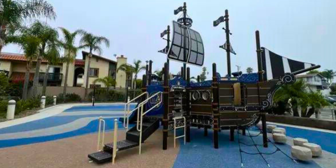 Shipwreck Park in Dana Point, featuring sunken ships submerged underwater, surrounded by marine life and coral reefs.