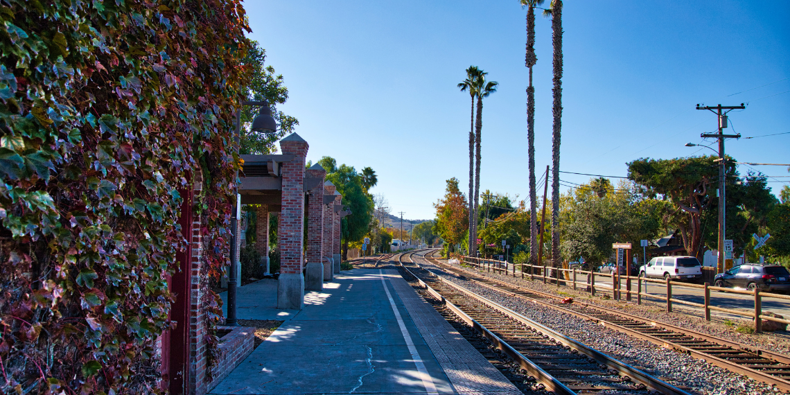 San Juan Capistrano Train Station: A quaint historic station nestled in the Los Rios Historic District. Timeless charm meets the tracks, surrounded by lush greenery.
