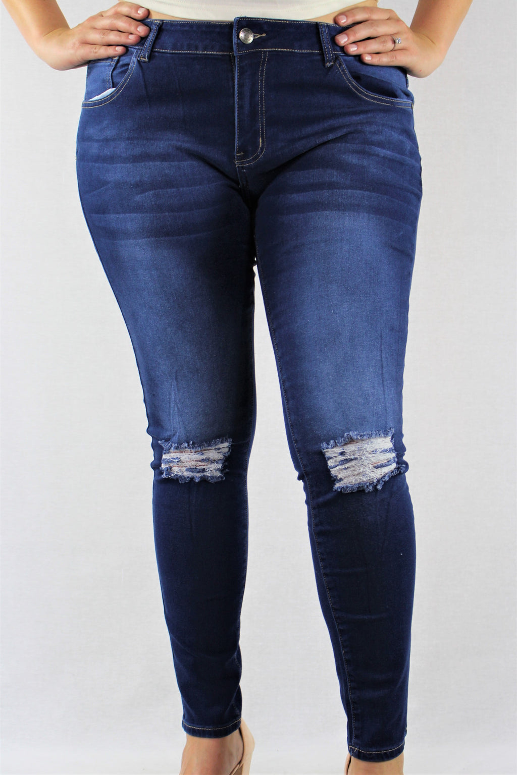 blue knee ripped jeans