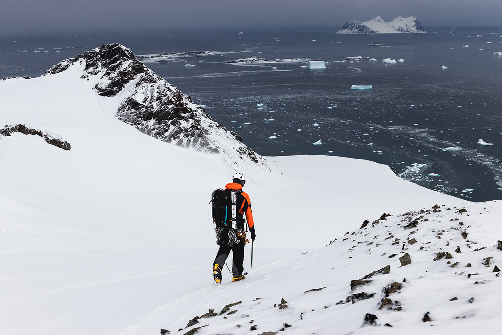Figure 5 - Marine ecology meets mountaineering. Walking along the ridgeline of South Stork, Adelaide Island, Antarctica to scout out possible areas of ice accumulation in the inner reaches of Ryder Bay.