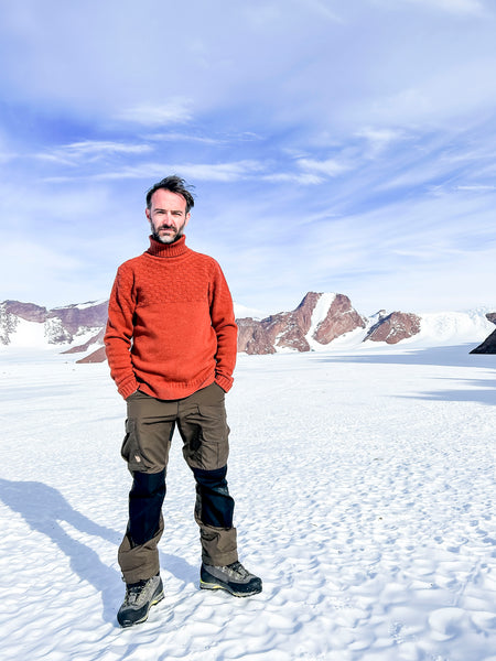 James Grecian wearing the Shackleton Hero Sweater in Antarctica