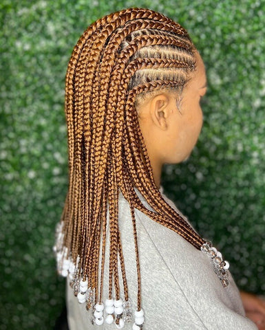 honey blonde straight-back cornrows with beads