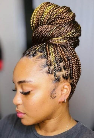 brown Small knotless box braids with blonde highlights updo