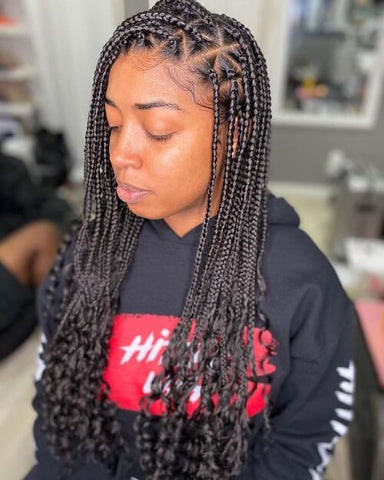 small knotless triangle box braids with curly ends