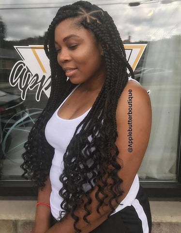 Side part triangle box braids with curls