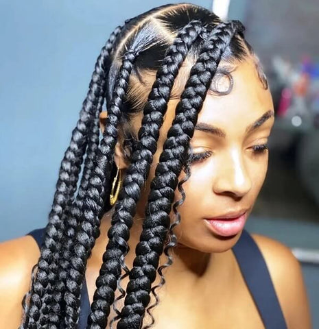Jumbo Box Braids With Flowing Curly Tresses