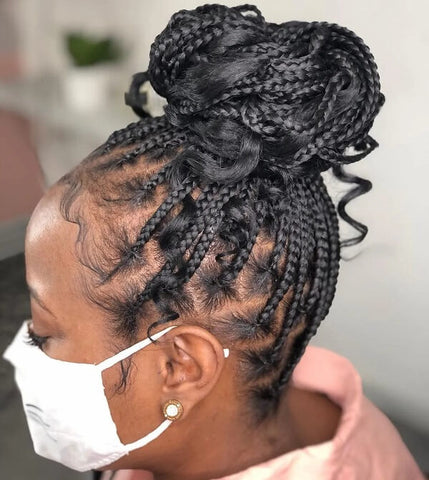 Box Braids Updo with Flowing Curls
