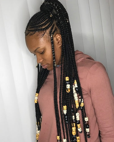 fulani braids wrapped with copper wire adornments