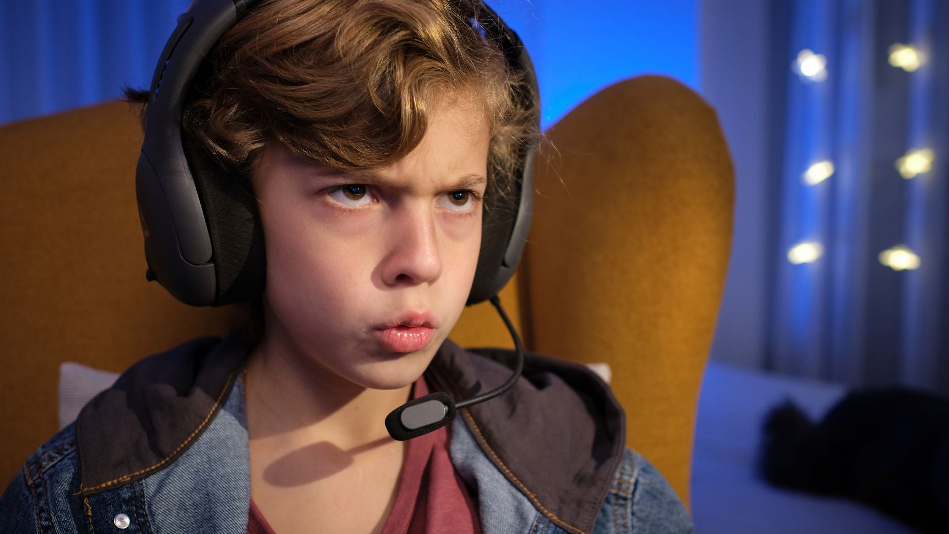 Boy gaming and angry with his teammates on his favourite video game