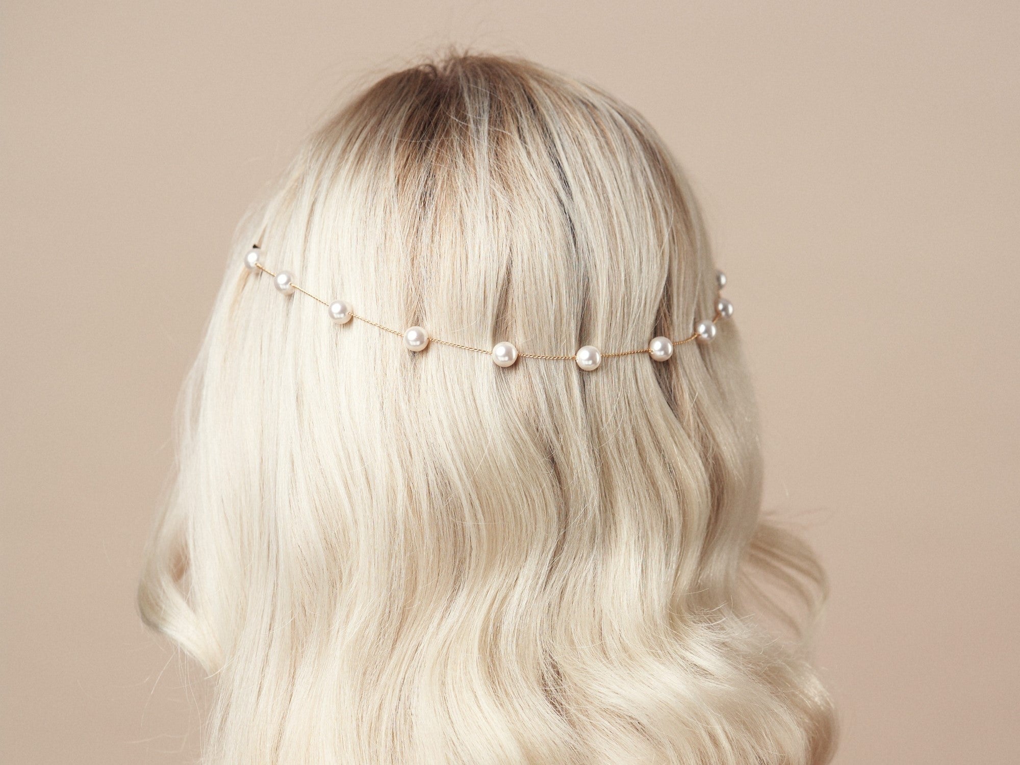 Gold pearl headband Prue worn by blonde model in back of her head