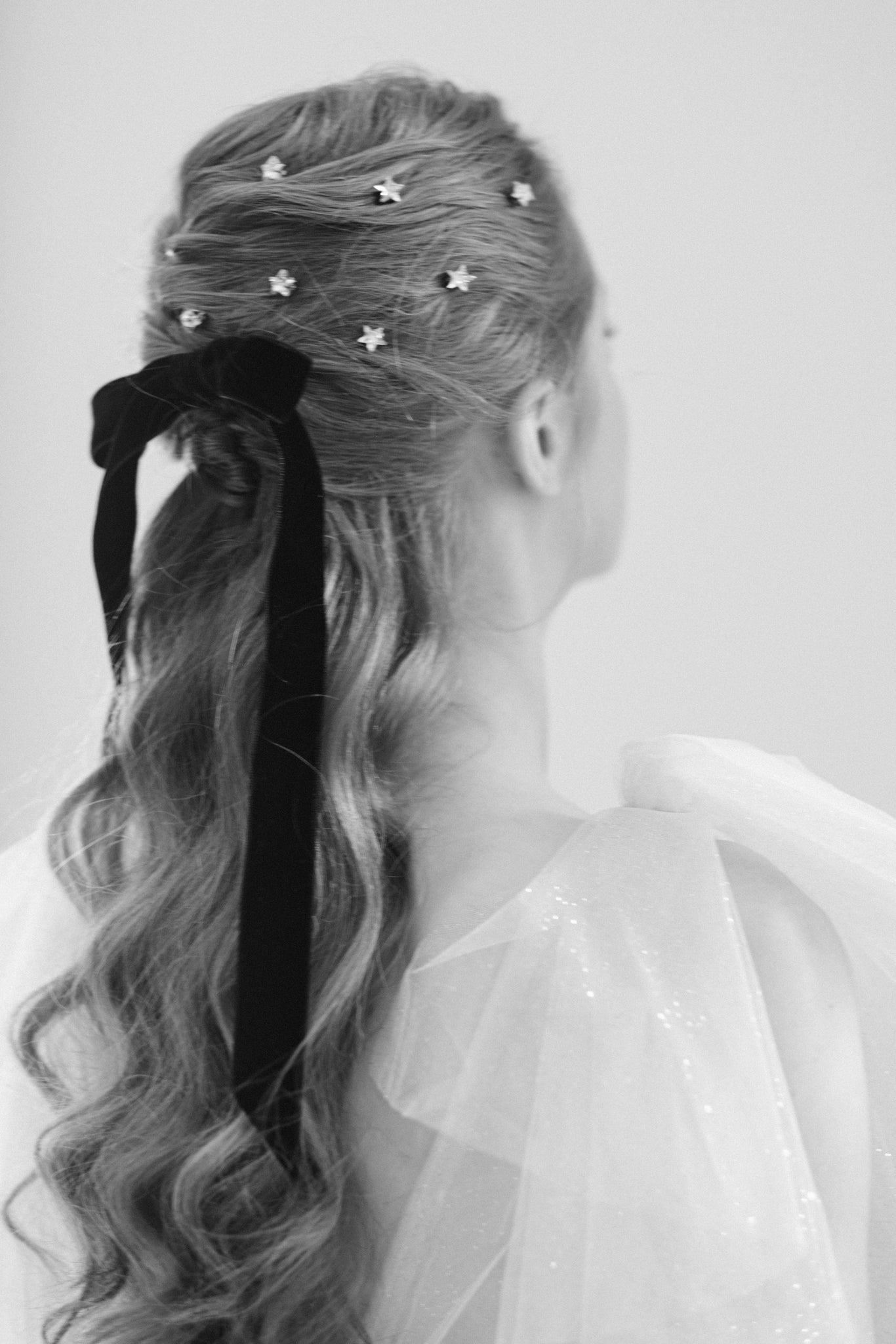 Black velvet bow with star hair pins