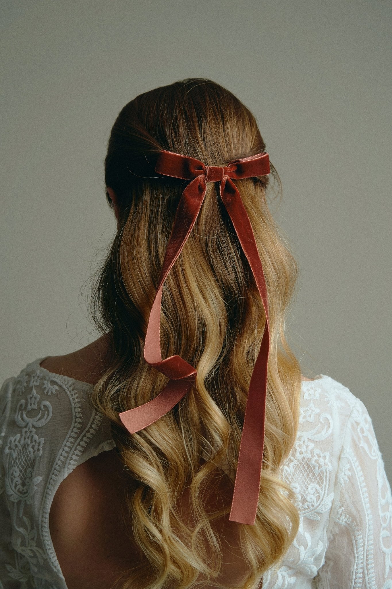 Rust velvet hair bow for a bridesmaid