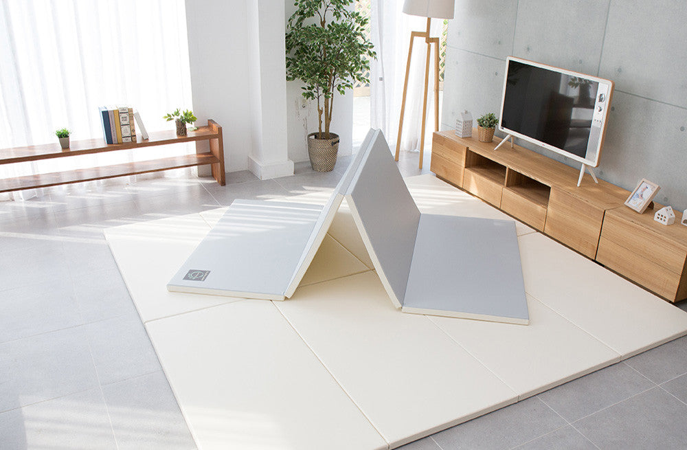 folding play mat by cream haus