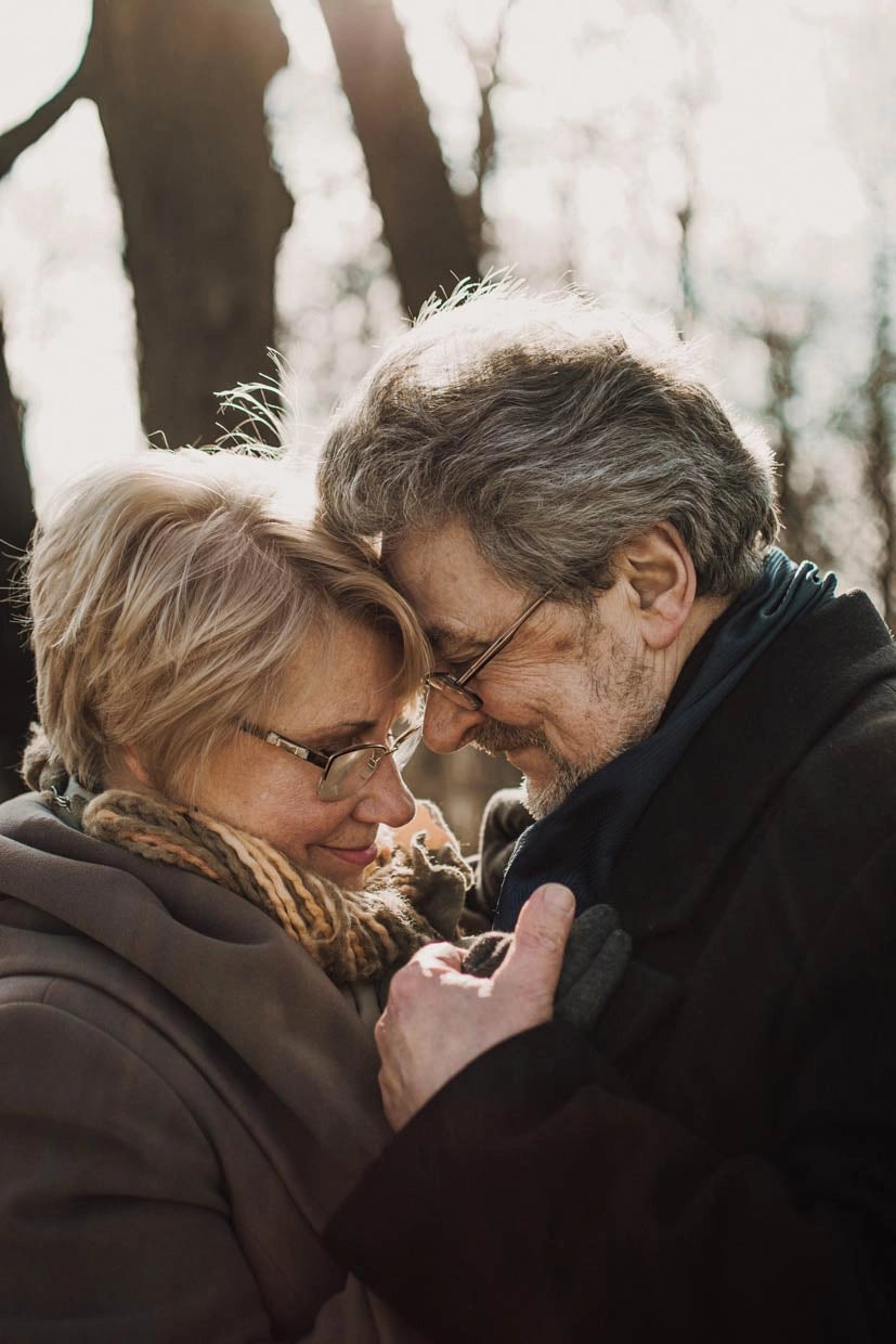Man and woman happily engaged in an intimate moment.