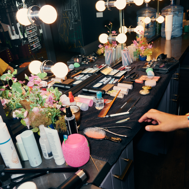 Backstage Shot of Glam Products on Table