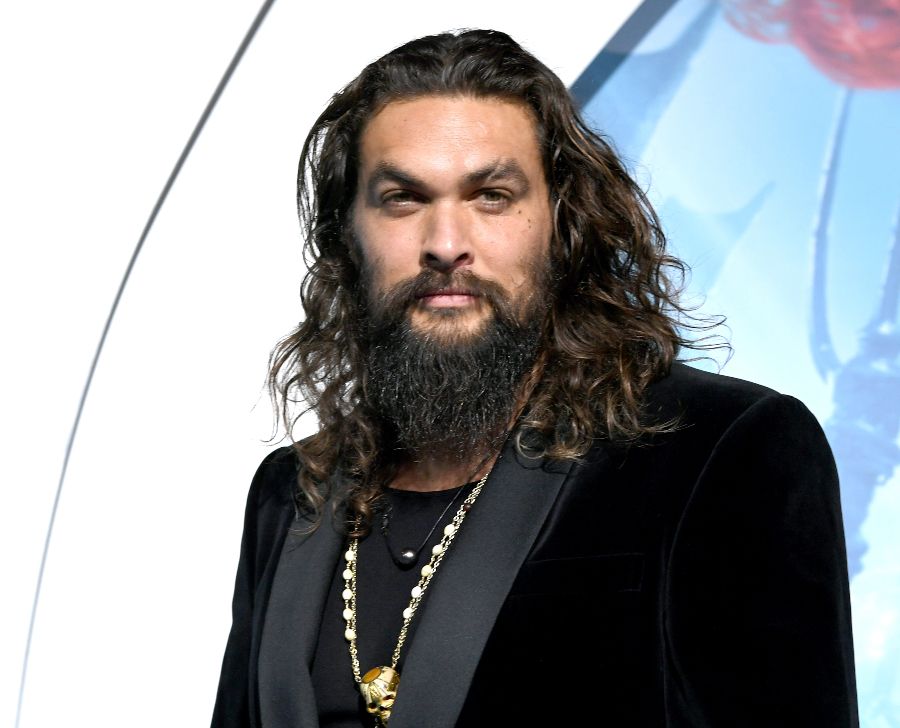 Premiere Of Warner Bros. Pictures' "Aquaman" - Red Carpet LOS ANGELES, CA - DECEMBER 12: Jason Momoa arrives at the premiere of Warner Bros. Pictures' "Aquaman" at the Chinese Theatre on December 12, 2018 in Los Angeles, California. (Photo by Kevin Winter/Getty Images) long hairstyles for men