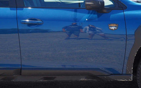 Réflexion photographie dans une porte de voiture