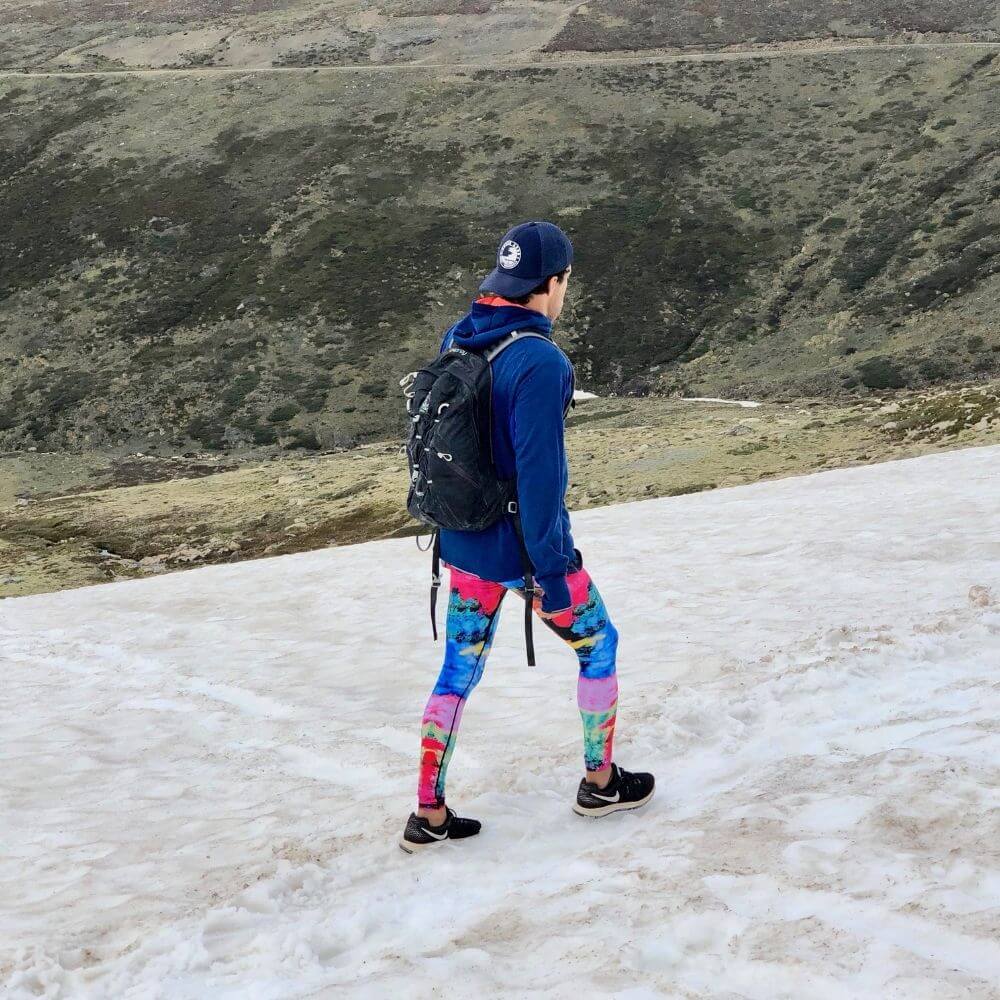 Man on a hike wearing Kapow meggings