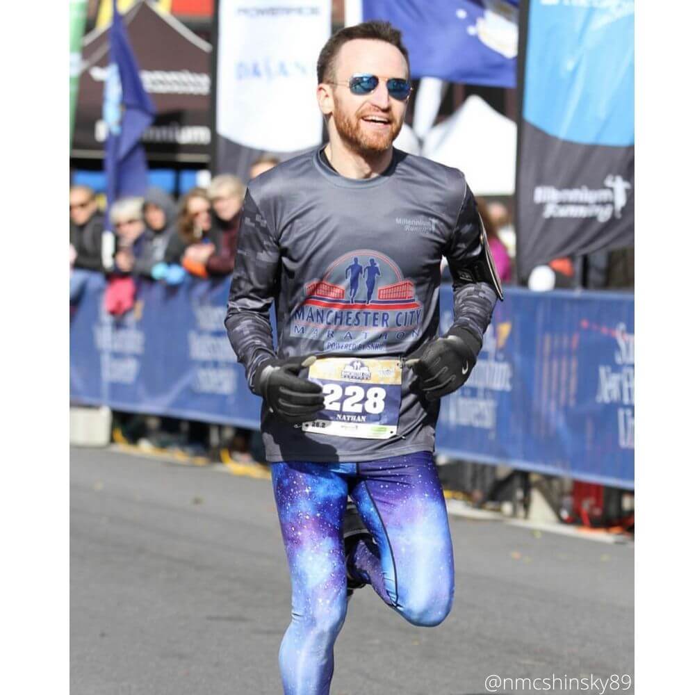 Man in a marathon wearing Starlord Men’s Performance Leggings