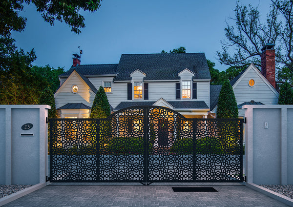 big house with beautiful laser cut black gate