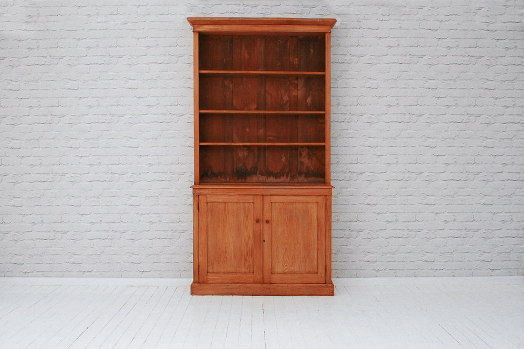 A Victorian Bookcase With A Two Door Cupboard Base White