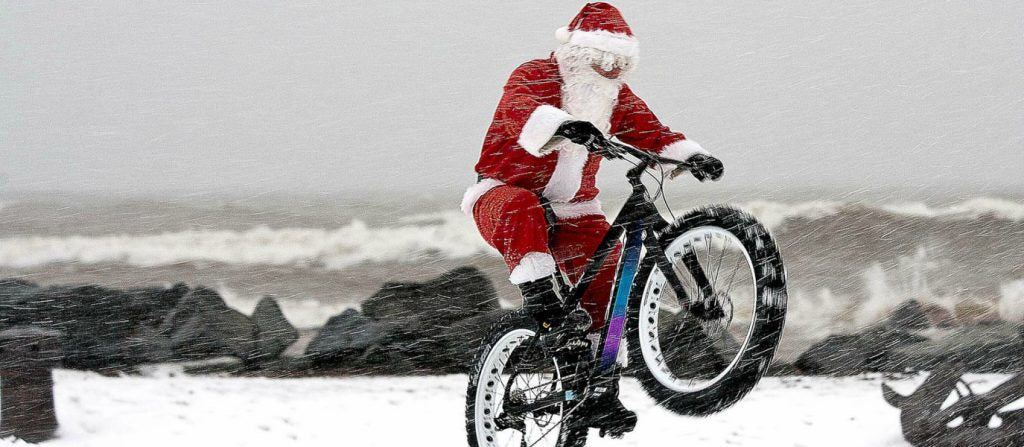 santa riding a bike