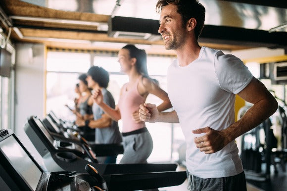 People working out on treadmills