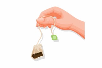 Illustration of a hand holding a tea bag with a green label.