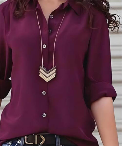 necklace outside the collar