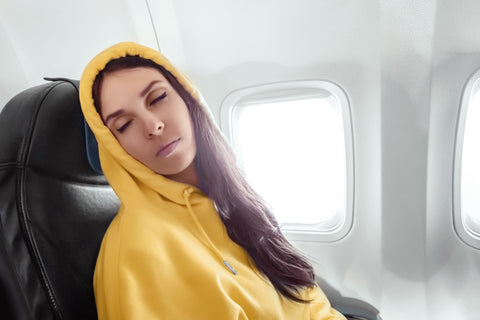 Girl Sleeping on a Plane
