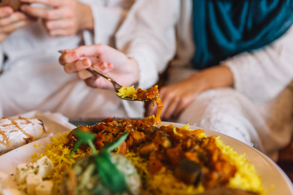 Woman Eating Arab Food