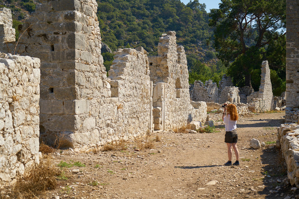 Woman Looking Ancient Ruins