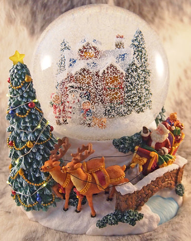 Large Christmas Snow Globes - Large Musical Wonderland Christmas Snow Globe Tinkerbells Emporium / Giant reindeer the worlds largest rocking horse can you rock the horse back and forth?