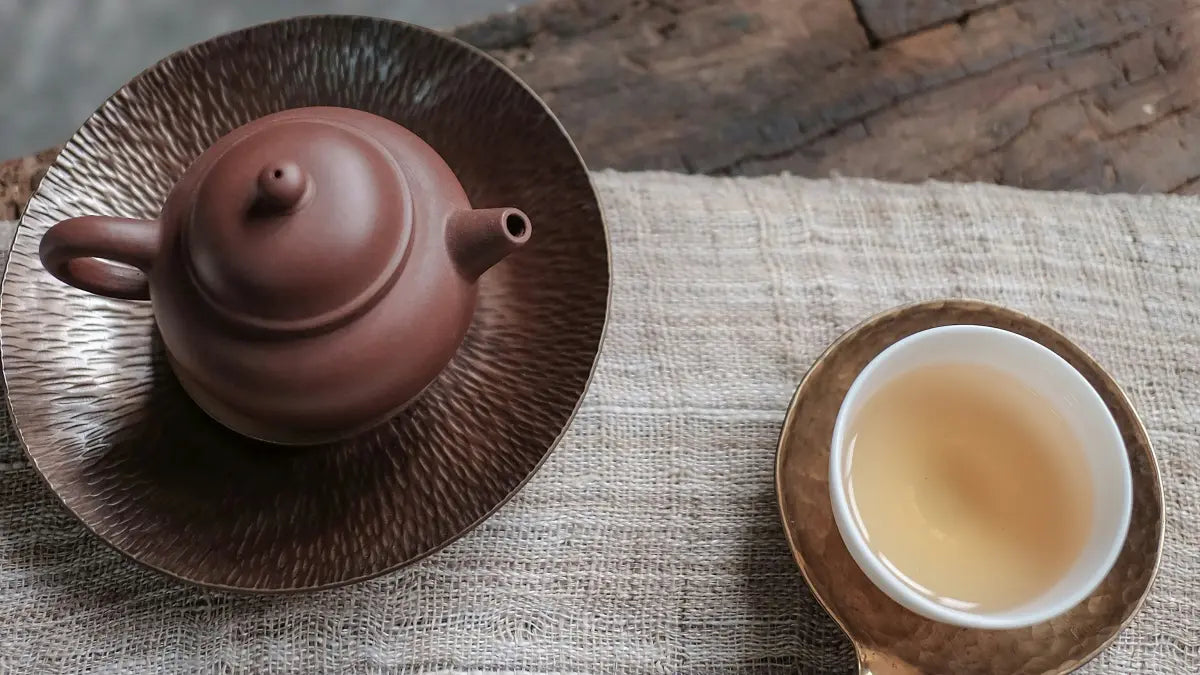 infuser du puerh cru dans un pot zisha