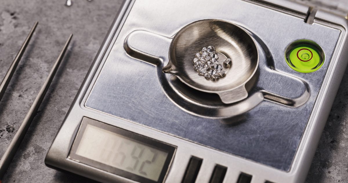 A diamond appraisal device measuring the carat weight of a diamond