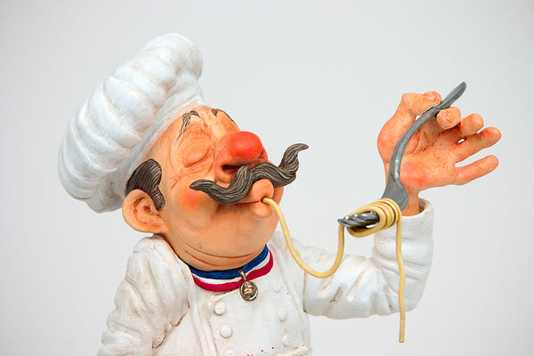 Guillermo Forchino sculpture of chef eating spaghetti 