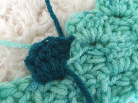 You can see the yarn in the wrong place where the wrong technique was used.