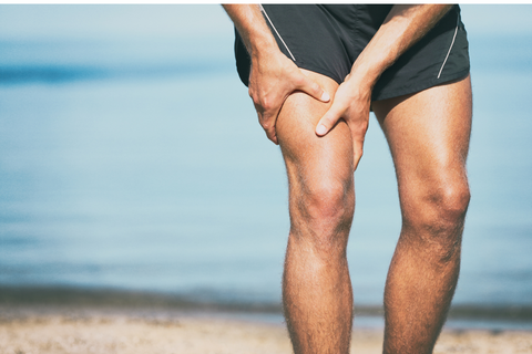 Man with leg cramp in upper thigh