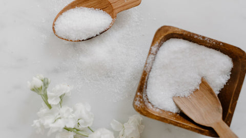 Epsom salts in brown wooden bowl